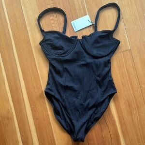 Brand new never worn Vitamin A black underwire one-piece swimsuit